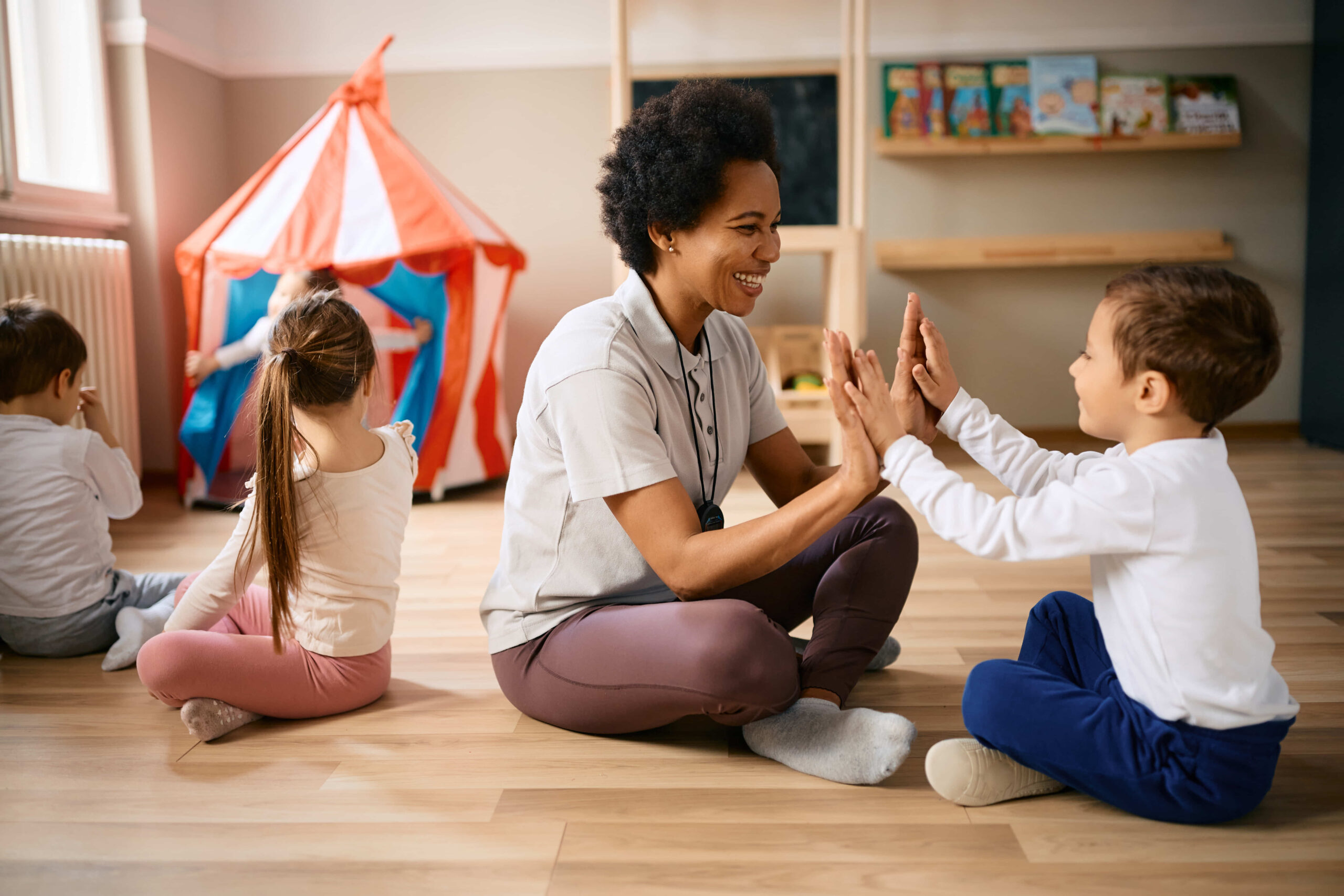 happy-black-pe-teacher-and-small-boy-having-fun-du-2023-02-02-19-54-02-utc